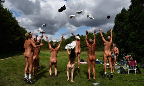 Nudists celebrating the creation of the Bois de Vincennes park in Paris on Thursday