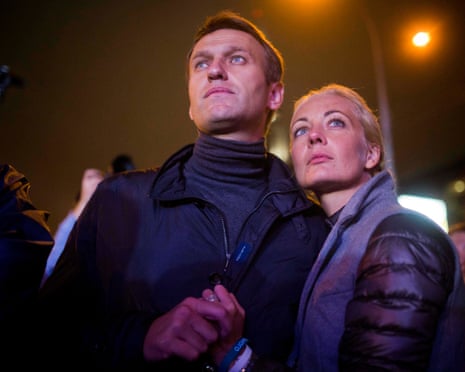 Russian opposition leader Alexei Navalny, left, and his wife, Yulia, in Moscow in 2013.