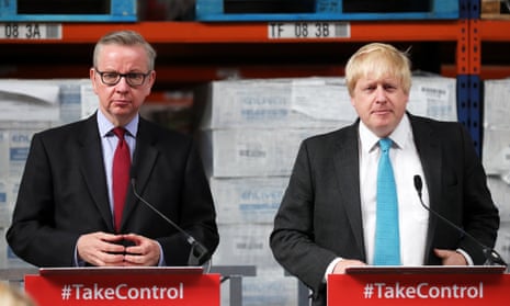 Michael Gove and Boris Johnson stand behind lecterns with the sign #TakeControl during a Vote Leave campaign visit in 2016.