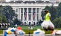 White House resists calls for President Biden to drop out of presidential race<br>epa11459186 The White House is seen behind a maintenance worker cleaning up the National Mall during a heat wave in Washington, DC, USA, 05 July 2024. With rising calls from within his own party to drop out of the presidential race following his debate performance, US President Joe Biden is attempting to reinvigorate his campaign with events in Wisconsin and Pennsylvania. EPA/JIM LO SCALZO