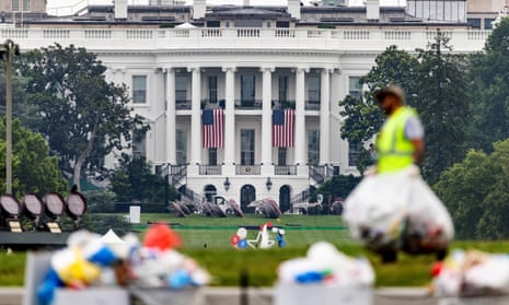 person cleans up outside white house