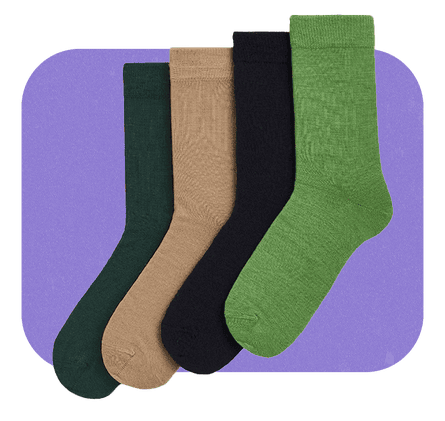 Four pairs of differently coloured merino socks for men.
