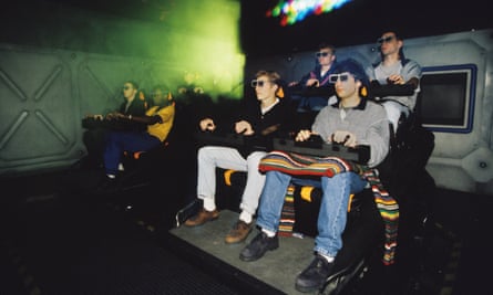 Visitors take a virtual reality trip with the SegaWorld 3D experience, circa 1997.