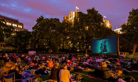 Cinema-goers watch The Shape of Water at an outdoor screen on Victoria Embankment in central London. 