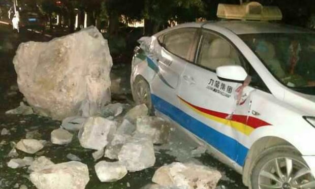 A taxi damaged by the earthquake in Jiuzhaigou county, China
