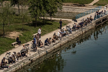 Men fishing in Pyongyang