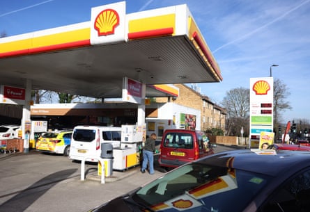 Cars on a petrol station forecourt in London last week