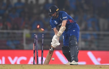 Mark Wood of England is bowled by Jasprit Bumrah of India.