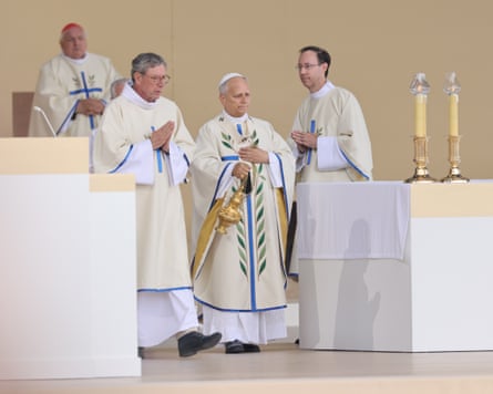 The Pope on stage delivering the mass.