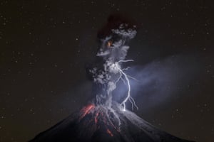 Nature, third prize singles - Sergio Tapiro - The power of nature: Colima volcano in Mexico explodes at night with lightning, ballistic projectiles and incandescent rockfalls