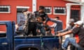 Pastor Rómulo and a group of his most trusted recovering alcoholics are loading up alcoholics from the streets onto the back of the pickup to bring them to the centre. 20.04.2024 Intibucá, Honduras