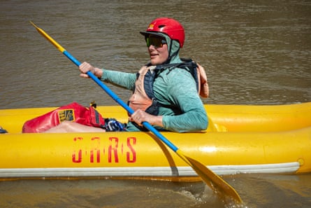 man successful raft steers pinch paddles