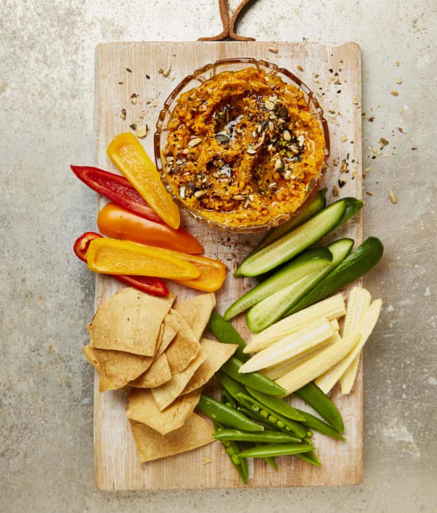 Yotam Ottolenghi’s roasted carrot and garlic dip with seed dukkah.