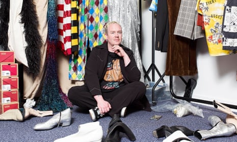 Harry Styles’s stylist, Harry Lambert, in his studio in Hackney, surrounded by clothes and shoes