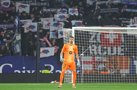Joan García plays in the derby, while Espanyol supporters hold flags picturing a red and blue rat