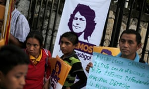 Demonstrators outside court during the murder trial of activist Berta Cáceres in Honduras.