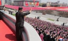 North Korea marks founder Kim Il-sung's birthday with mass parade but no weapons
