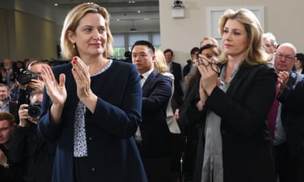 Amber Rudd and Penny Mordaunt clapping