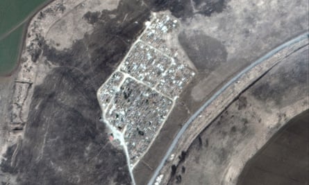 Satellite imagery of fresh graves in Vynohradne, east of Mariupol.