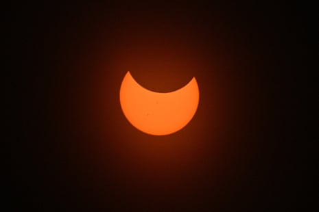 The Moon passes in front of the Sun as seen from Albuquerque, New Mexico.