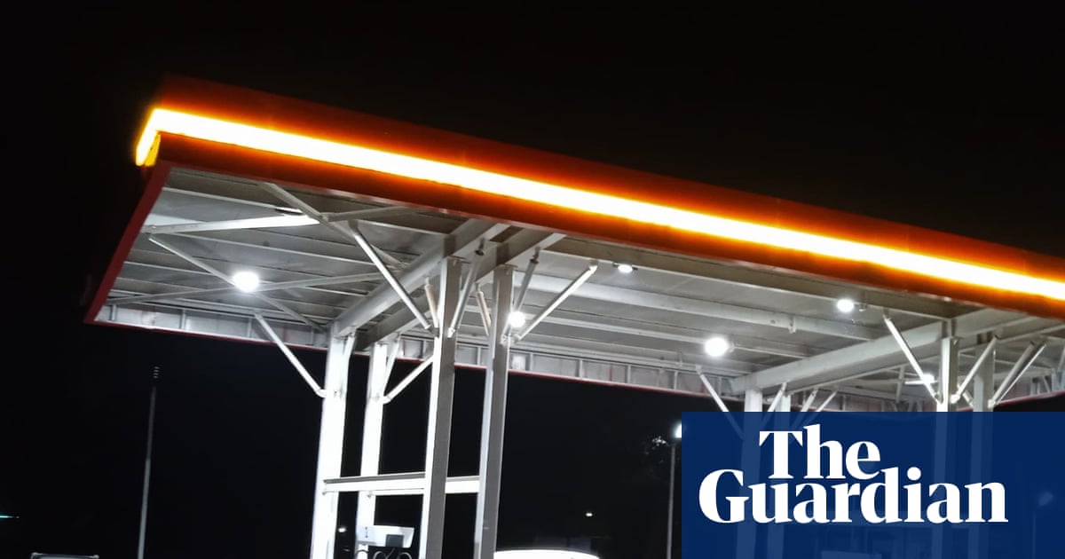 ‘This petrol station is my home now’: Malawi’s fuel crisis forces desperate drivers to queue for days