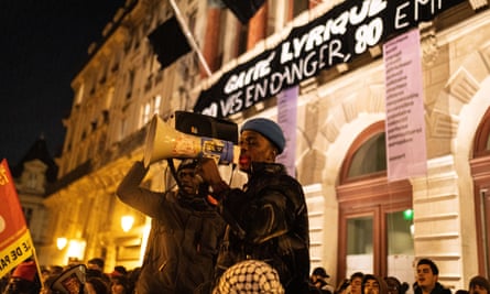 Protesters with megaphones outside Gaite Lyrique