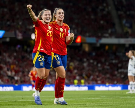 Alèxia Putellas (right) helps Clàudia Pina celebrate the goal that put Spain 2-0 up against Switzerland.