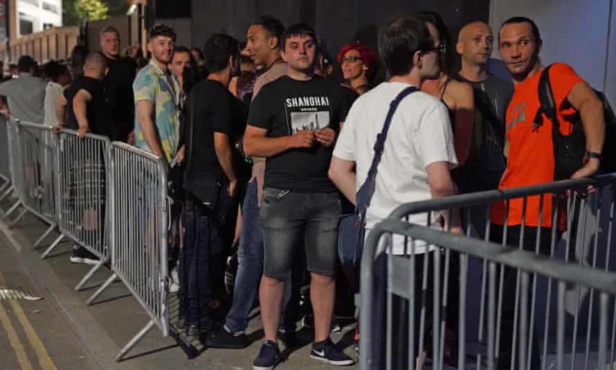 People queuing at night