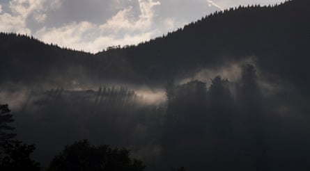 Dawn breaks over the valleys near Whangamatā in the Coromandel Peninsula, New Zealand. An expansion of goldmining activity is planned for the ranges behind the town.