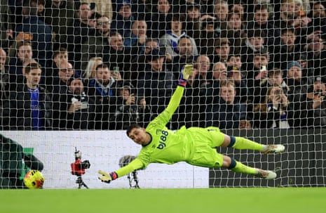 Chelsea's Cole Palmer scores their first goal from the penalty spot past Bournemouth's keeper Djordje Petrovic.