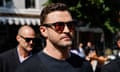 Justin Timberlake wearing sunglasses outside court