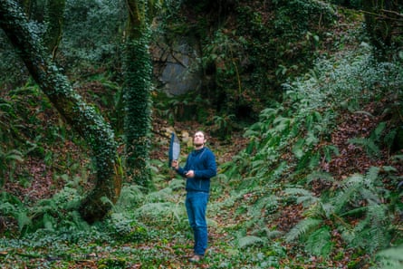 Bird whisperer Seán Ronayne photographed in a woodland in Cork, Ireland