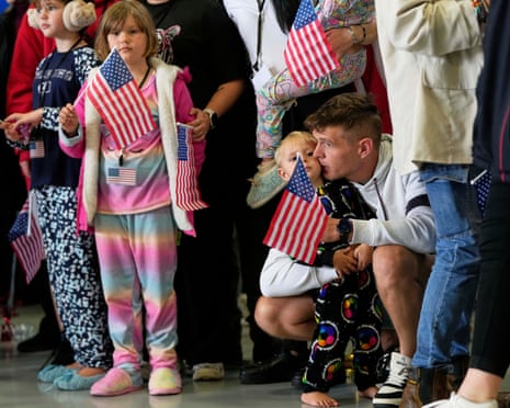 children holding US flags