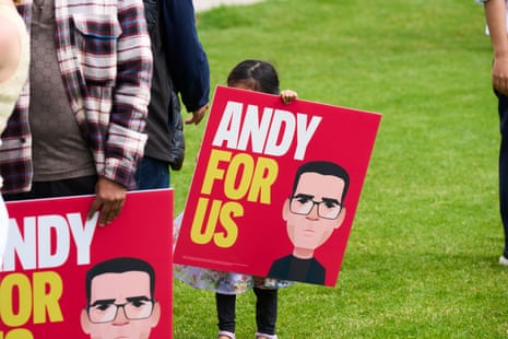Andy Burnham supporters celebrating at Ashton Town FC on the morning of his Makerfield byelection win.