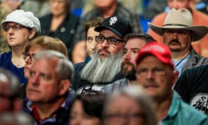 The audience listens to Trump’s speech.