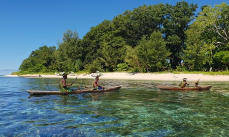 Traditional canoe welcome for visitors performed by villagers from Nyapio Island, Manus Province