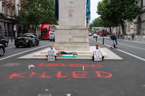 Activists from Youth Demand staging a protest about the government’s Gaza policy at the Cenotaph.