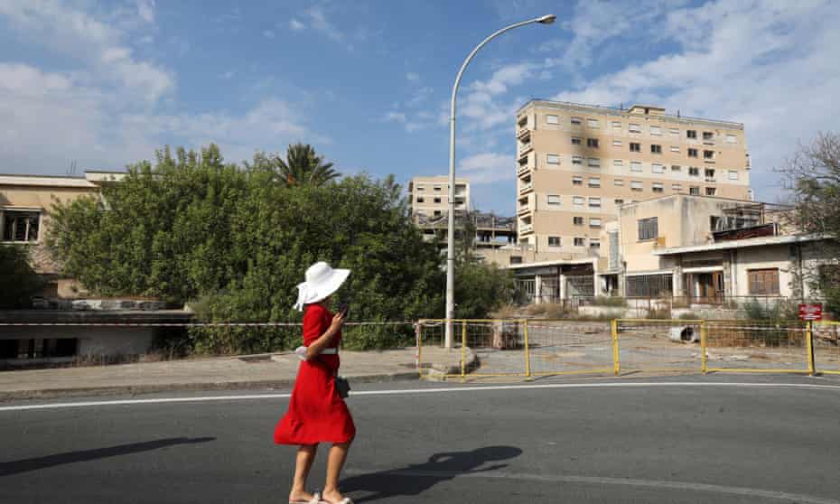 A woman walks through a newly-opened street in Varosha, Cyprus, in October.