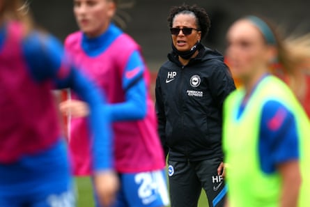 Hope Powell leading a Brighton warmup in May 2021