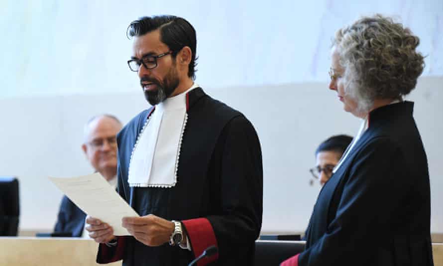 Supreme Court judge Lincoln Crowley (left) during a swearing in ceremony with Queensland Chief Justice Helen Bowskill (right) in Brisbane