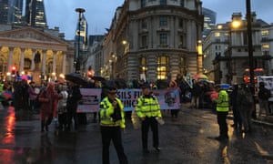 Extinction Rebellion protesters outside the Bank intersection in the City of London