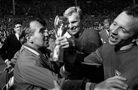 England's manager Alf Ramsey (left) celebrates his team’s 4-2 victory over West Germany with the captain, Bobby Moore, and Nobby Stiles