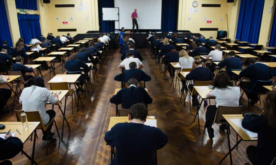 Welsh teenagers sit an exam.