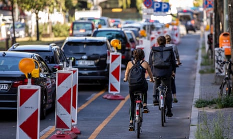 Cyclists use a ‘pop-up’ bike road in Kreuzberg district in Berlin, Germany. 