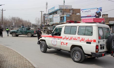 An ambulance transports the wounded to hospital after the attack in Kabul