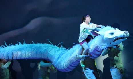 No strings attached … Mone Kamishiraishi as Chihiro rides the giant puppet dragon Haku in Spirited Away