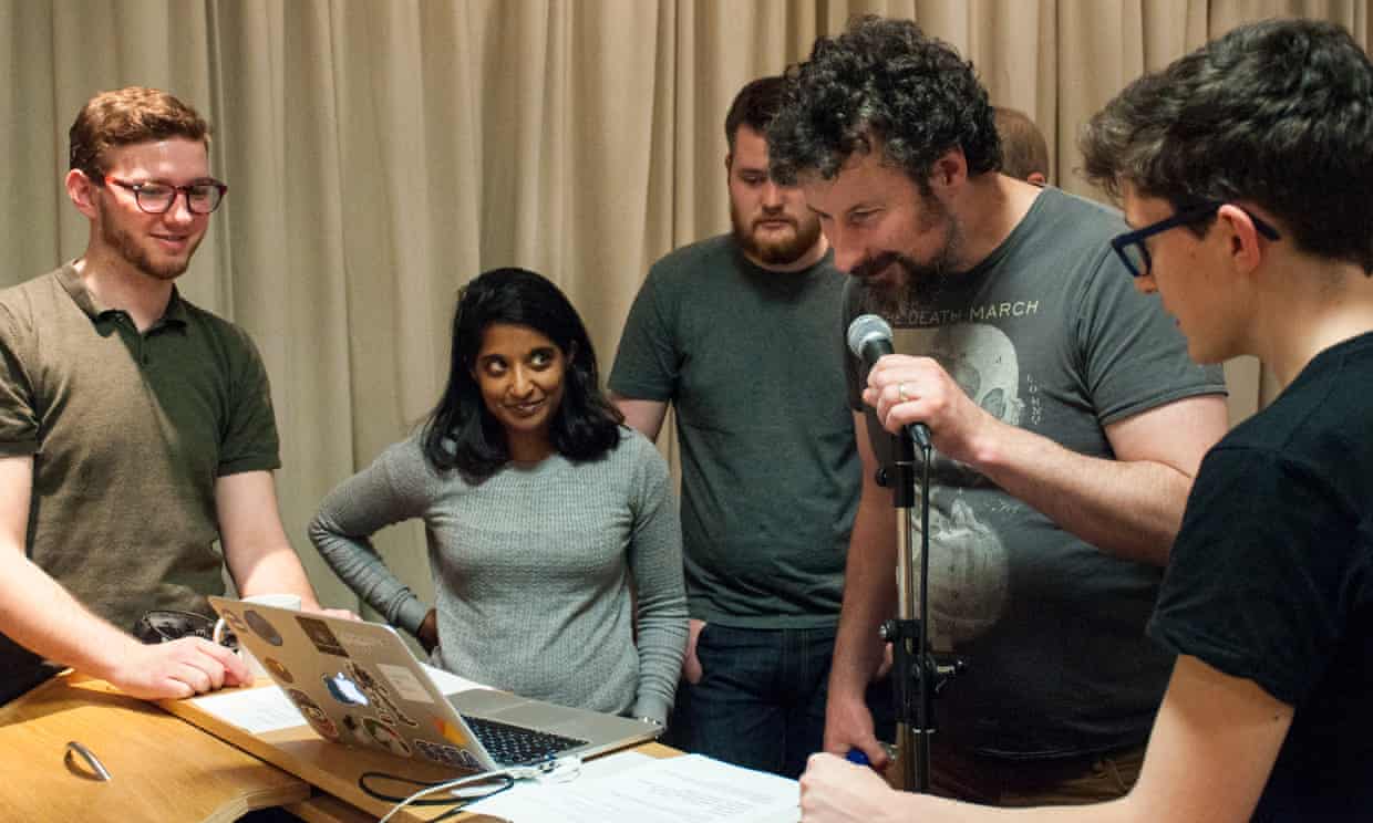 Members of Guardian Digital using verbal commands to control a Macbook
