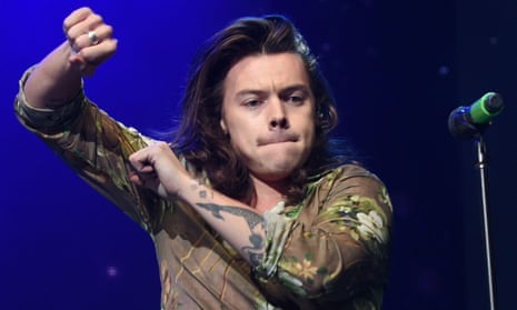 Harry Styles performs as part of One Direction.