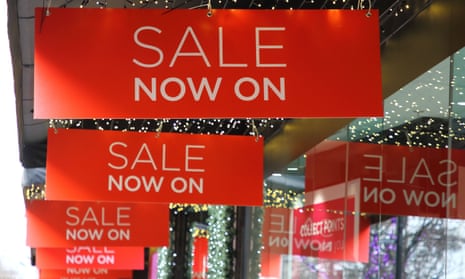 Sales signs up at John Lewis in Oxford Street, London, before Christmas