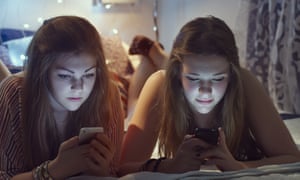 girls on their phones